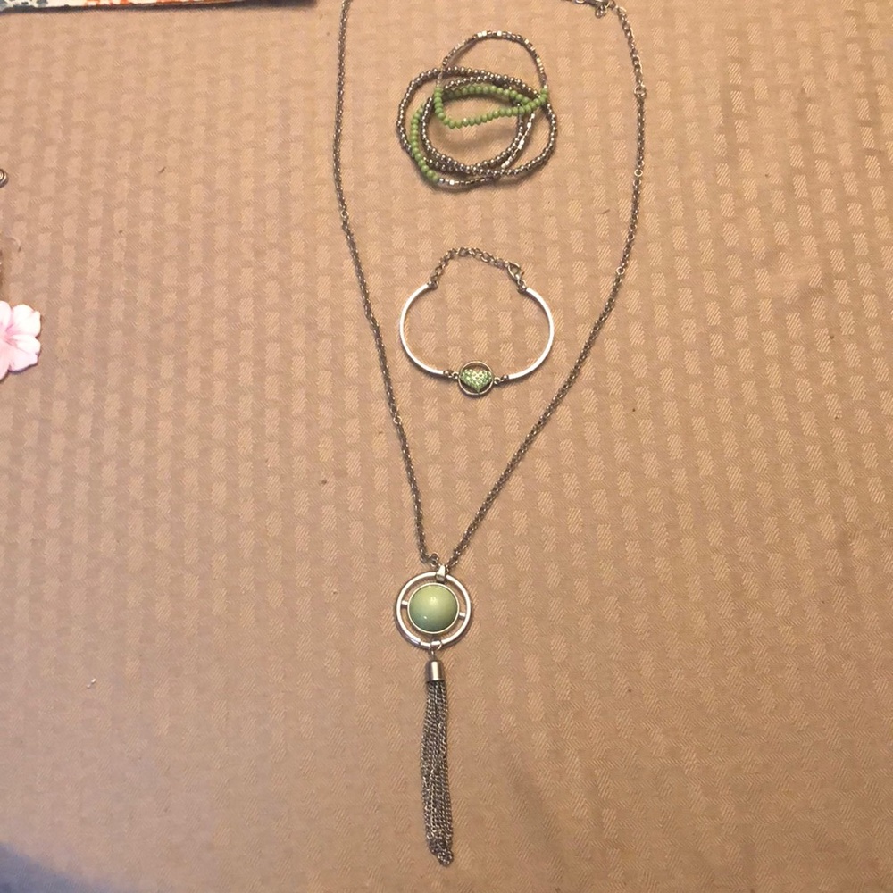 Set of 1 necklace, 2 bracelets, and 1 earring